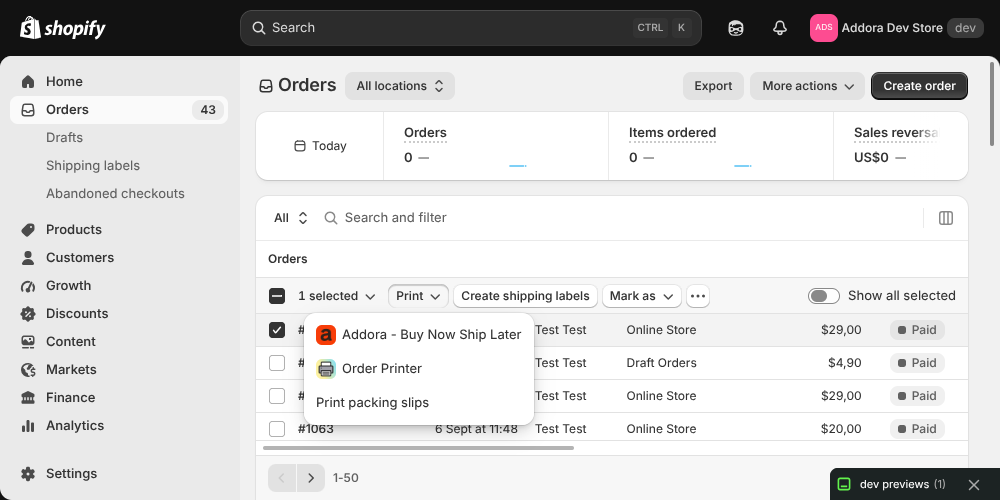 In Shopify Orders, select orders and open Print. The Addora entry opens the action. Captured in the Addora dev store.